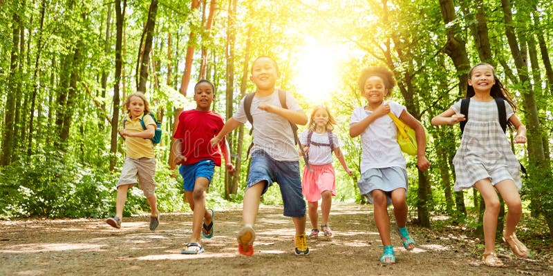Kids running in forest
