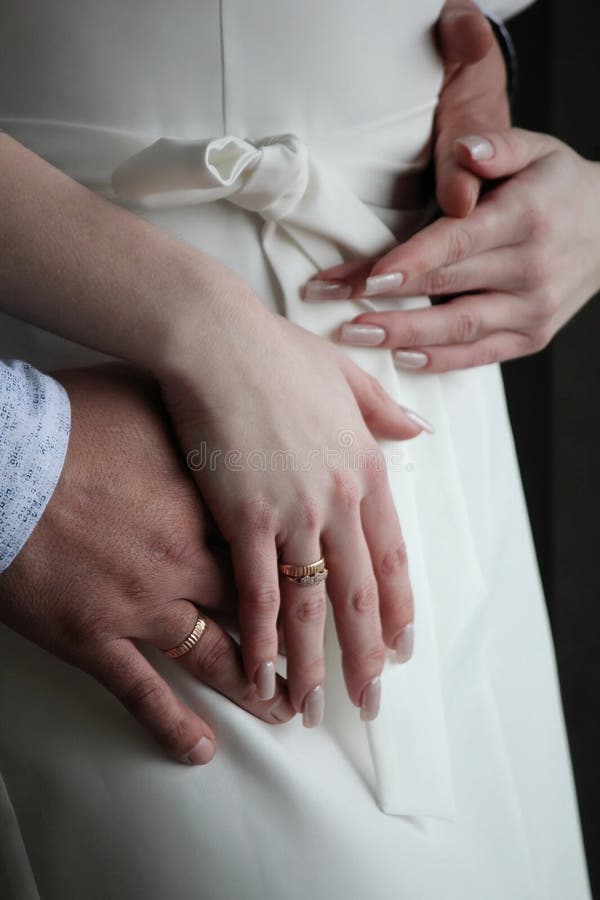 Detalle manos y anillos