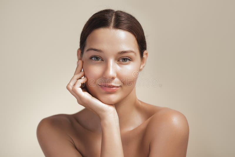 Natural Beauty Woman with Glowing Skin Smiling in Soft Studio Light Stock  Photo - Image of woman, model: 382658528