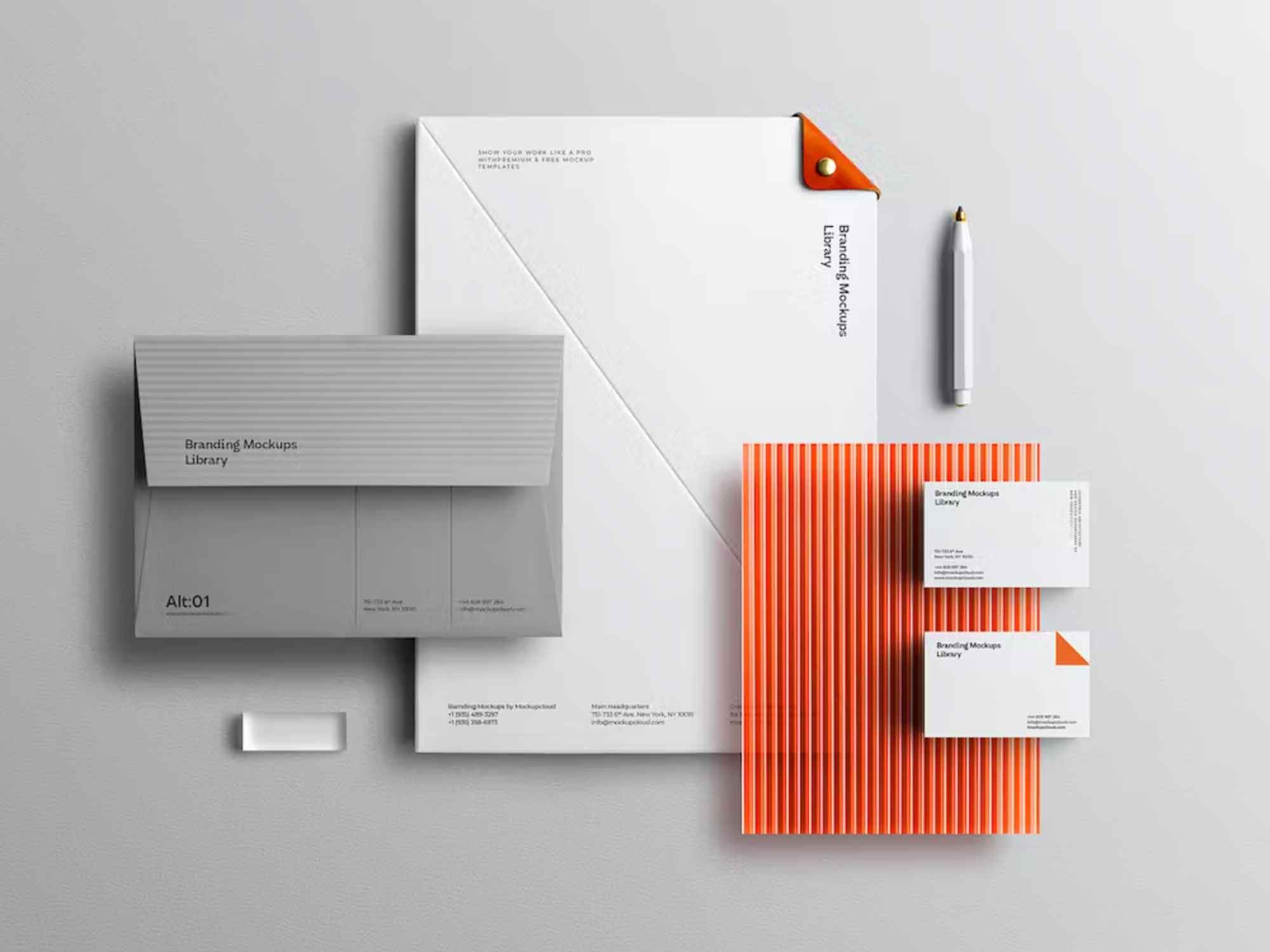 Minimalist grey and orange stationery set with letterhead and envelopes