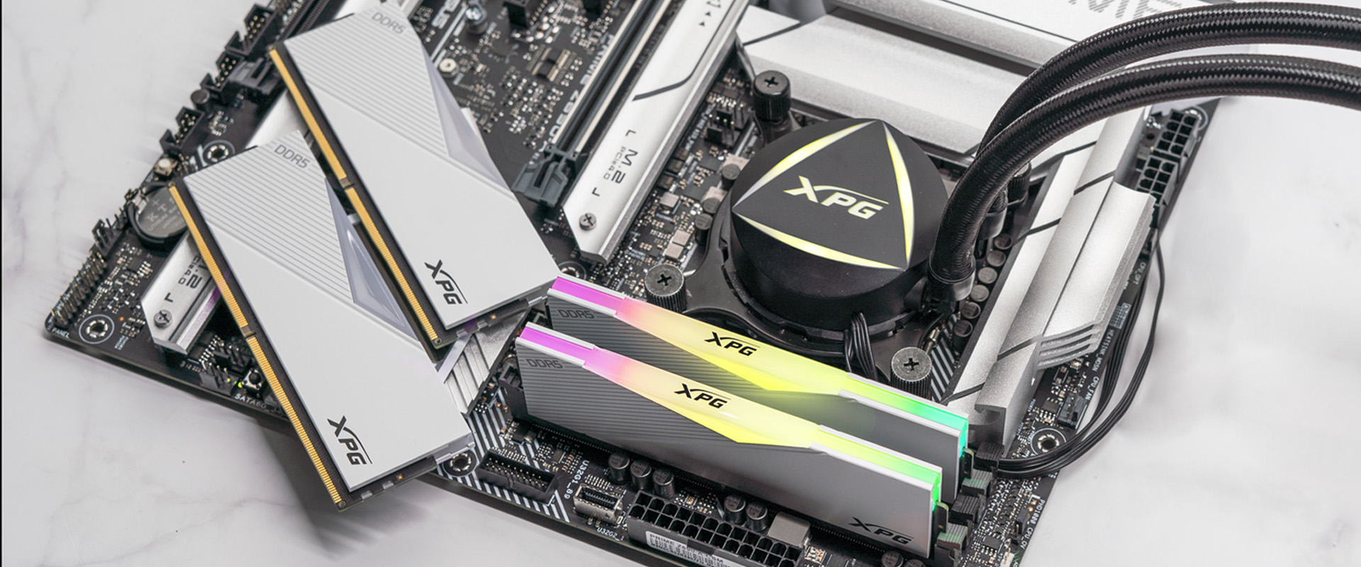 ADATA XPG Lancer RGB DDR5-6000 memory installed on motherboard with vibrant RGB lighting