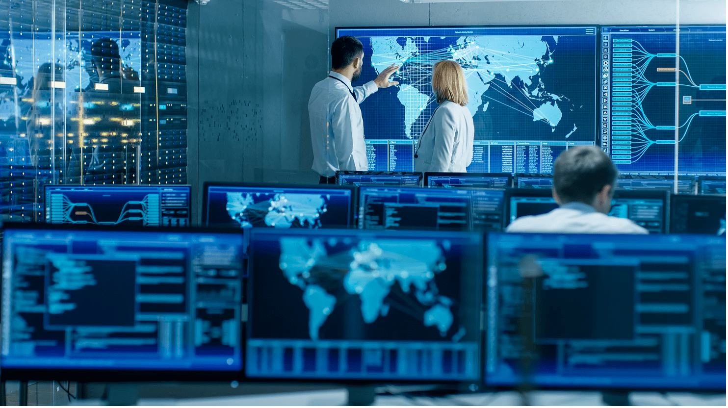 Cybersecurity operations center with professionals monitoring systems