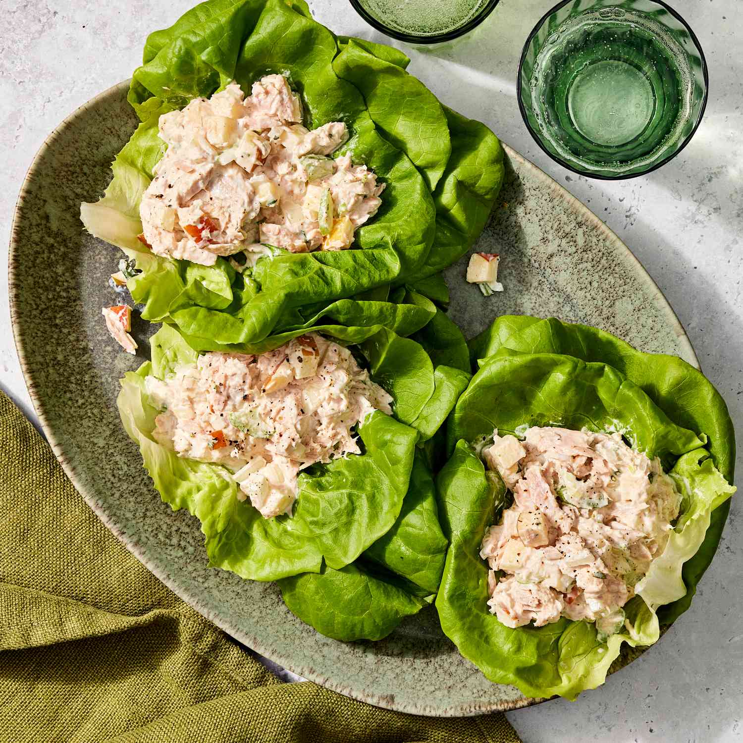 Low-carb chicken lettuce wraps as a healthy family dinner option Fresh low-carb chicken lettuce wraps on a plate for a healthy family meal