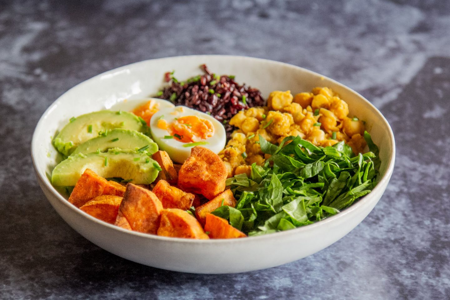 Healing gut health bowl with roasted vegetables, chickpeas, and greens