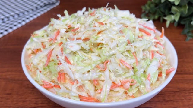Coleslaw made with shredded cabbage, grated carrots, sweet corn, green pepper, mayonnaise and a pinch of sugar - RoyalRoom Restaurant Lagos