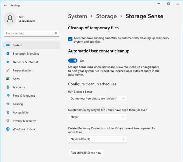 Windows 11 Storage Sense settings showing automatic cleanup of temporary files