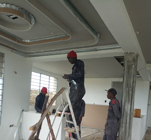 Kenyan gypsum ceiling workers