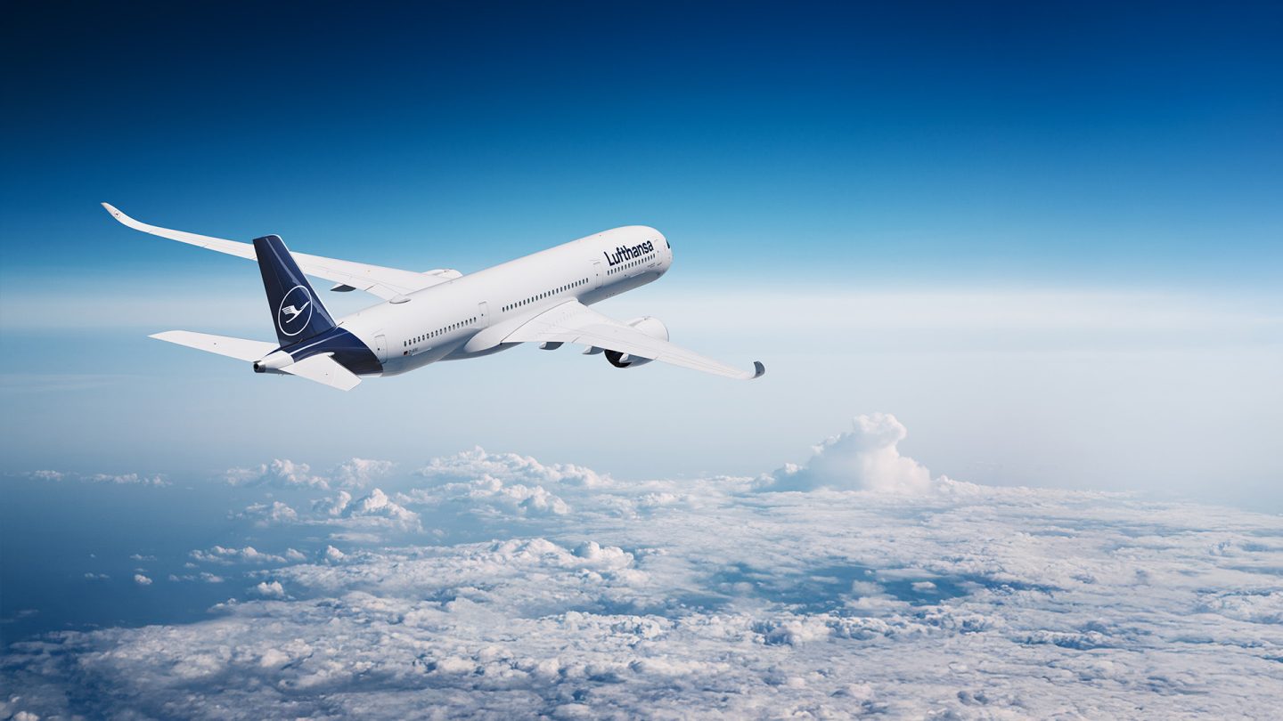 Lufthansa airplane flying above clouds representing flight change and booking support