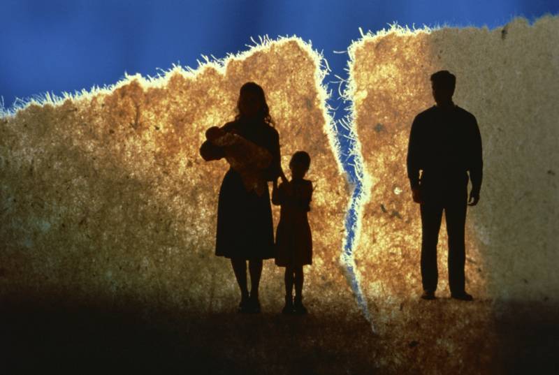 Torn family silhouette