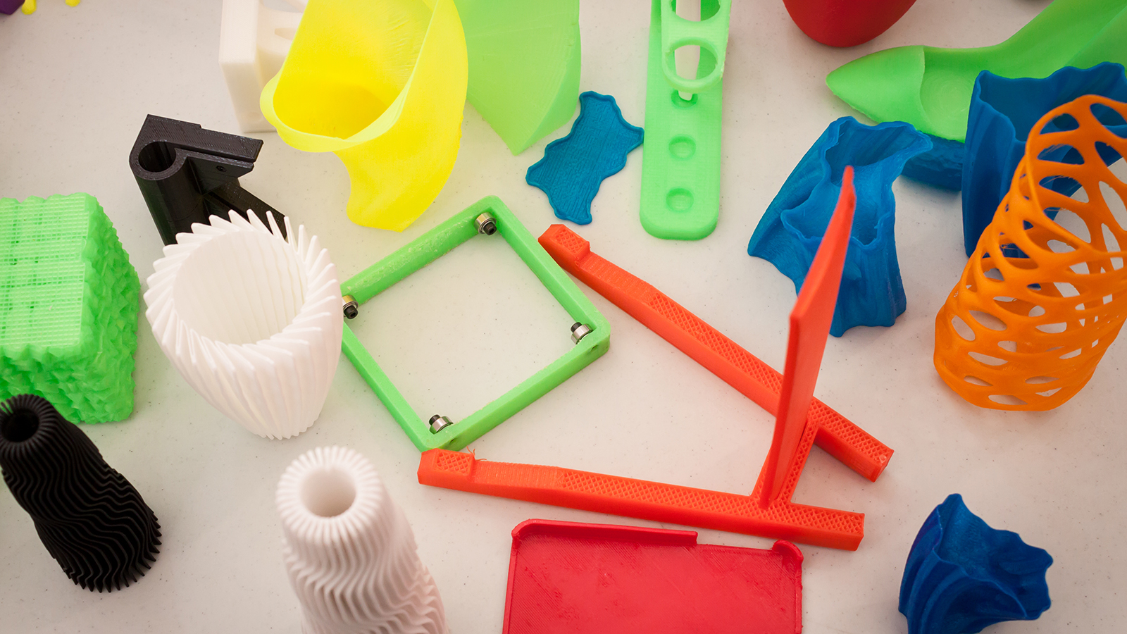 3D Printed Assistive Devices in Production - Colorful Custom Grips and Aids