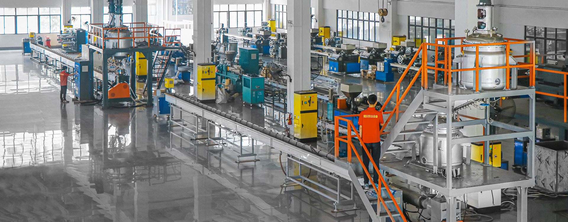 Modern plastic extrusion machine factory floor with quality control inspection