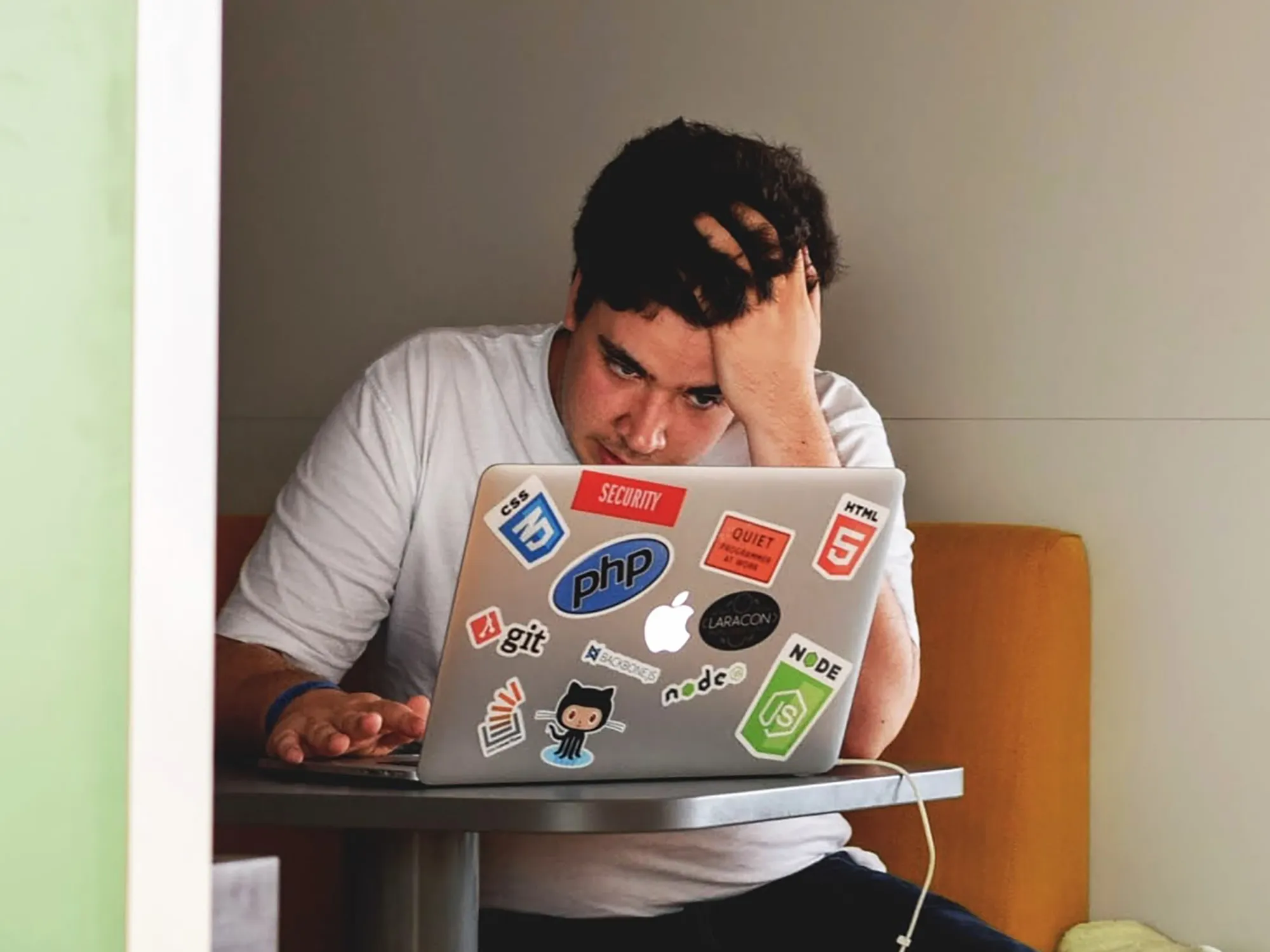 Frustrated User with Slow Windows PC Frustrated person looking at slow laptop computer screen