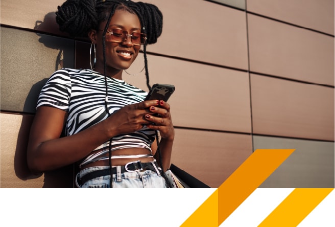 Young Kenyan professionals using smartphones for online shopping