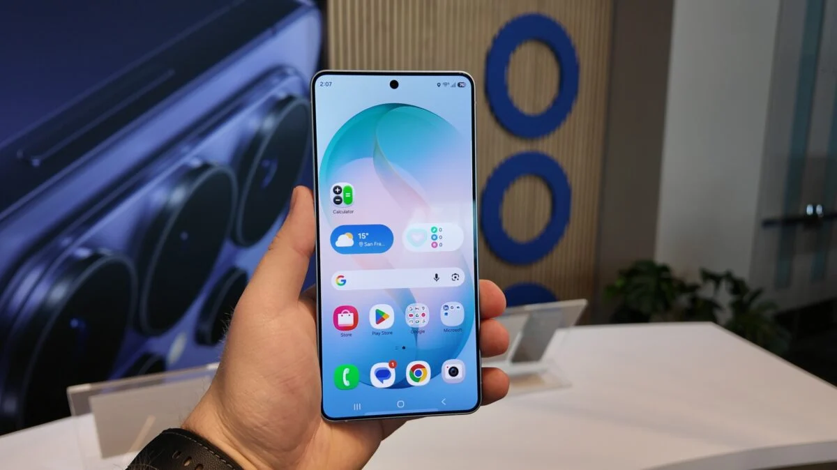 Samsung Galaxy S26 Ultra held in hand showing display and home screen