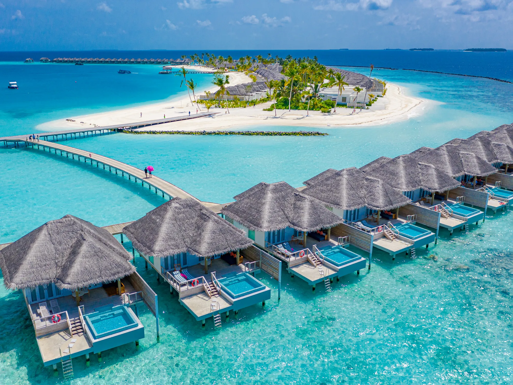 Maldives Honeymoon Package - Overwater villas and crystal clear lagoon