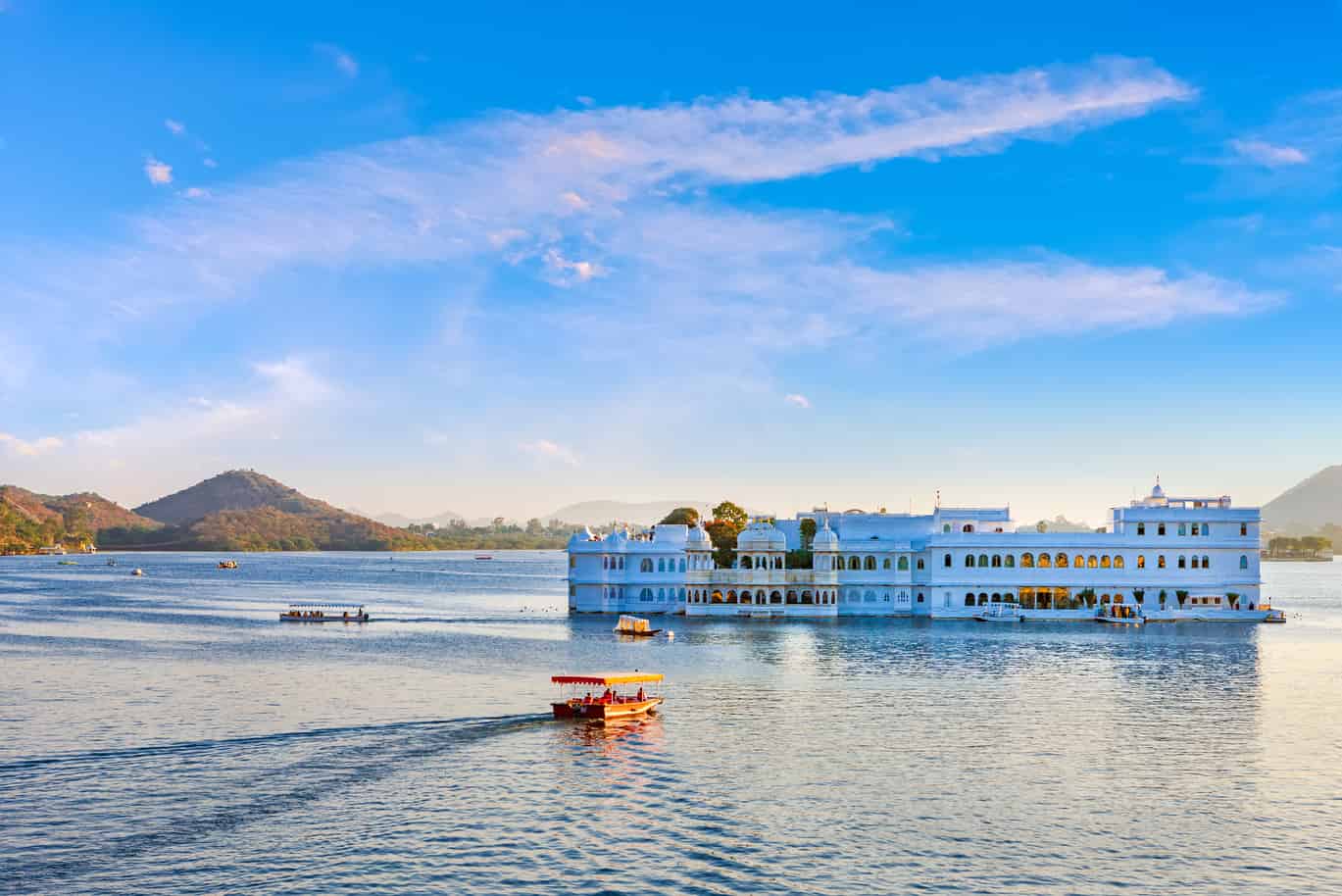 Lake Palace Udaipur Lake Pichola scenic view with boat