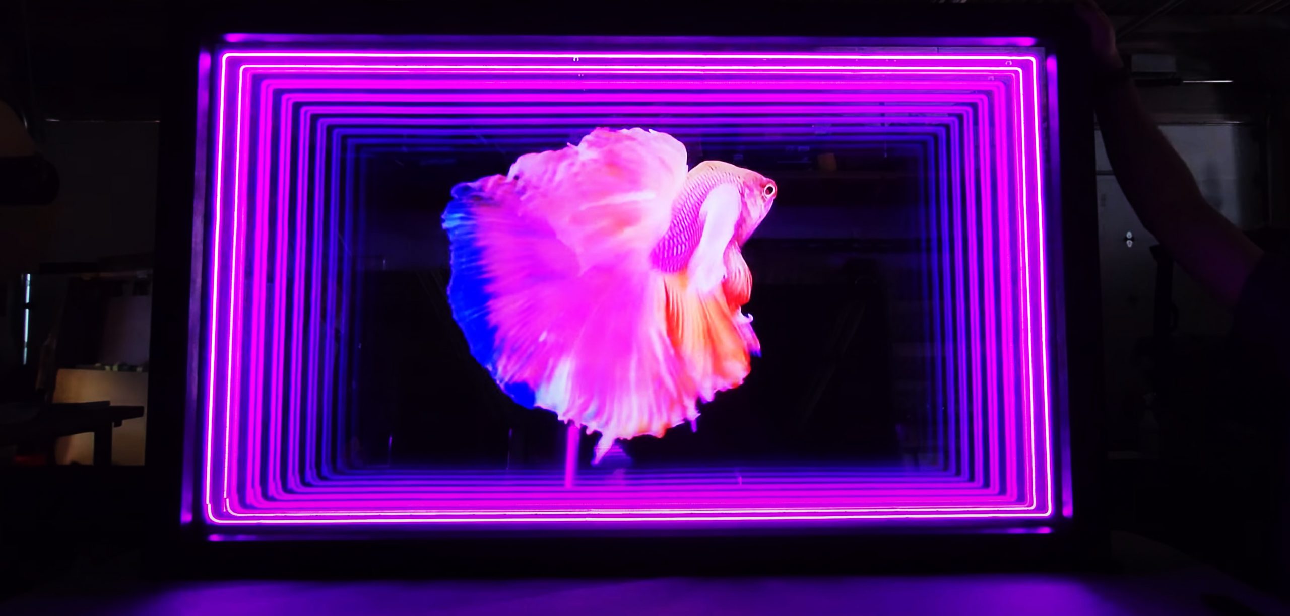 Infinity mirror with endless reflections creating a holographic effect